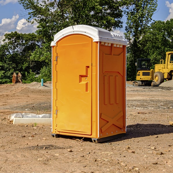 how often are the portable restrooms cleaned and serviced during a rental period in Armagh